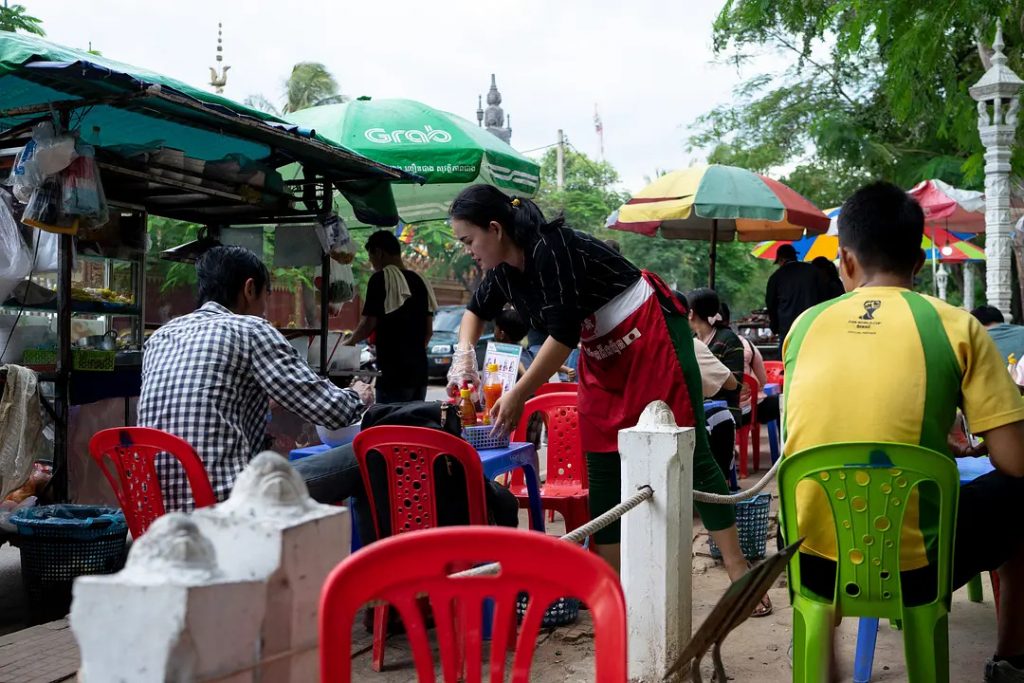 Street food vendors by the Siem Reap River